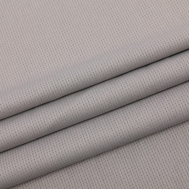 Tissu maille à œillets gris chiné cationique