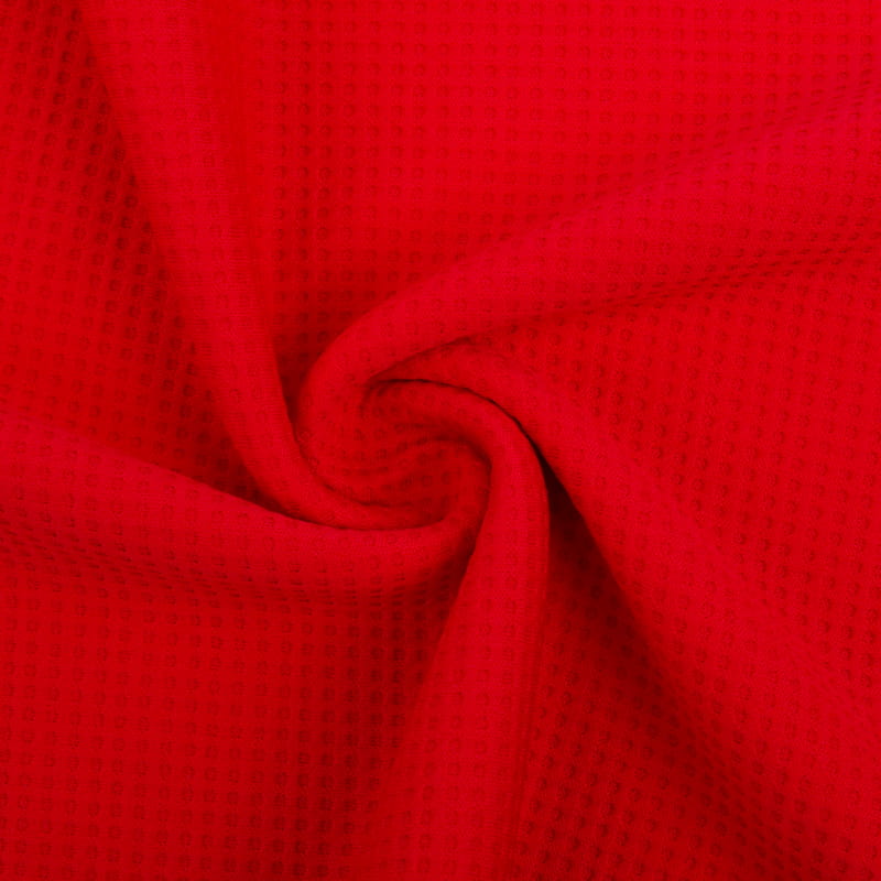 Tissu tricot gaufré brossé en polyester uni